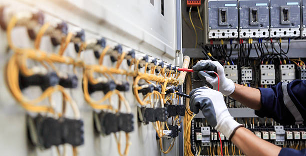 Professional Electrical Panel Upgrade technician working in Lamar County County, TX